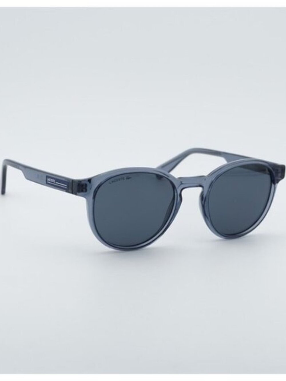 Lacoste L6055S N 038 Sunglasses Grey Round Frame, Grey Lenses